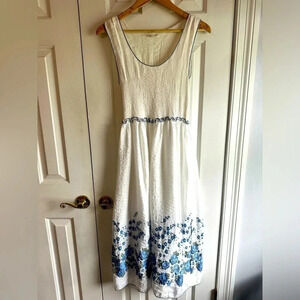 Sophie Max white midi dress with smocked bodice & needle point flowers on hem.